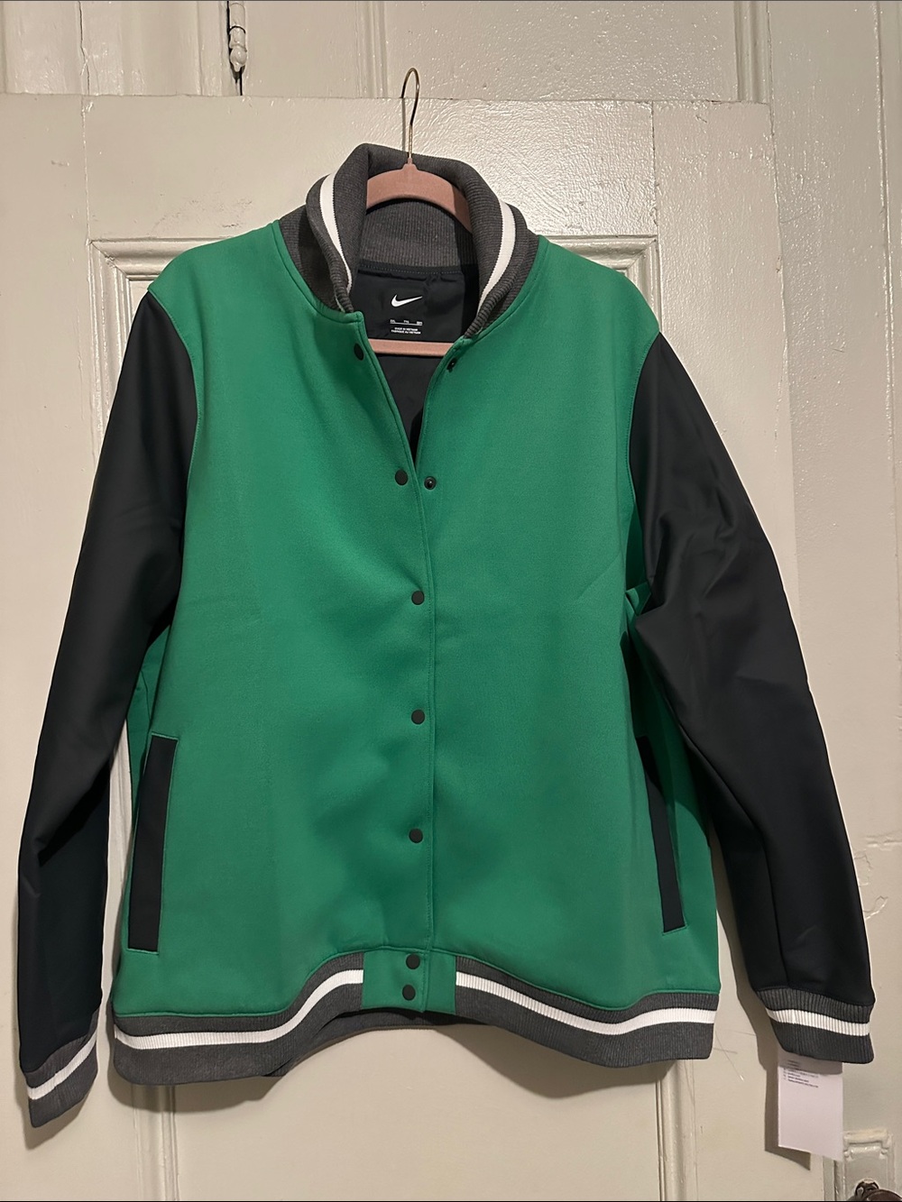 NWT Nike Green and Black Nike Women's Varsity Jacket. Size XXL. 32” L x 23”W.